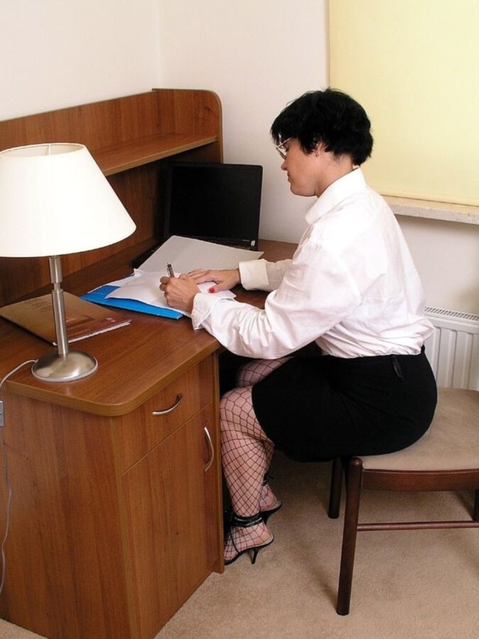 Secretary In Black Fishnets