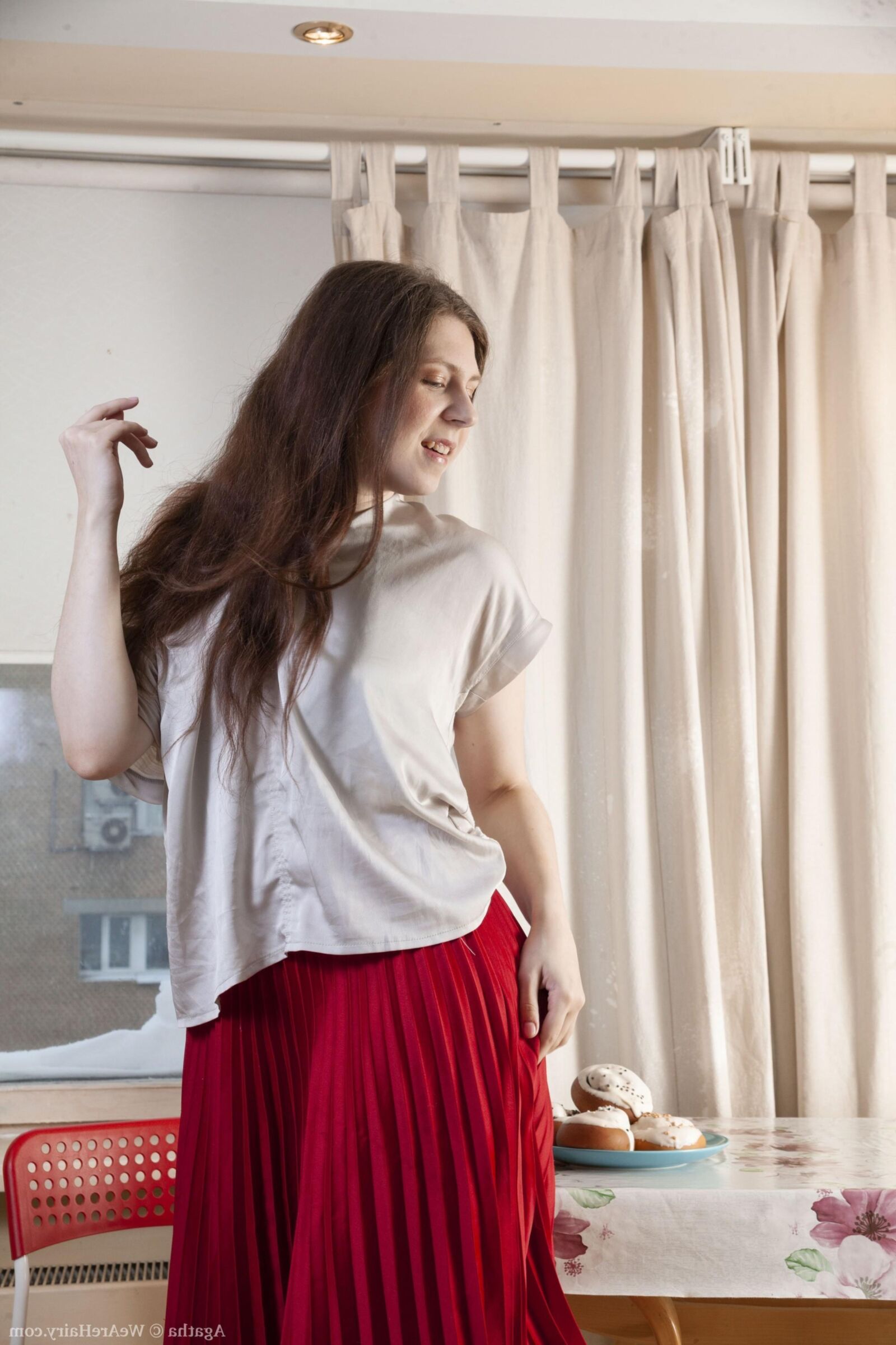 Hairy Agatha in red skirt