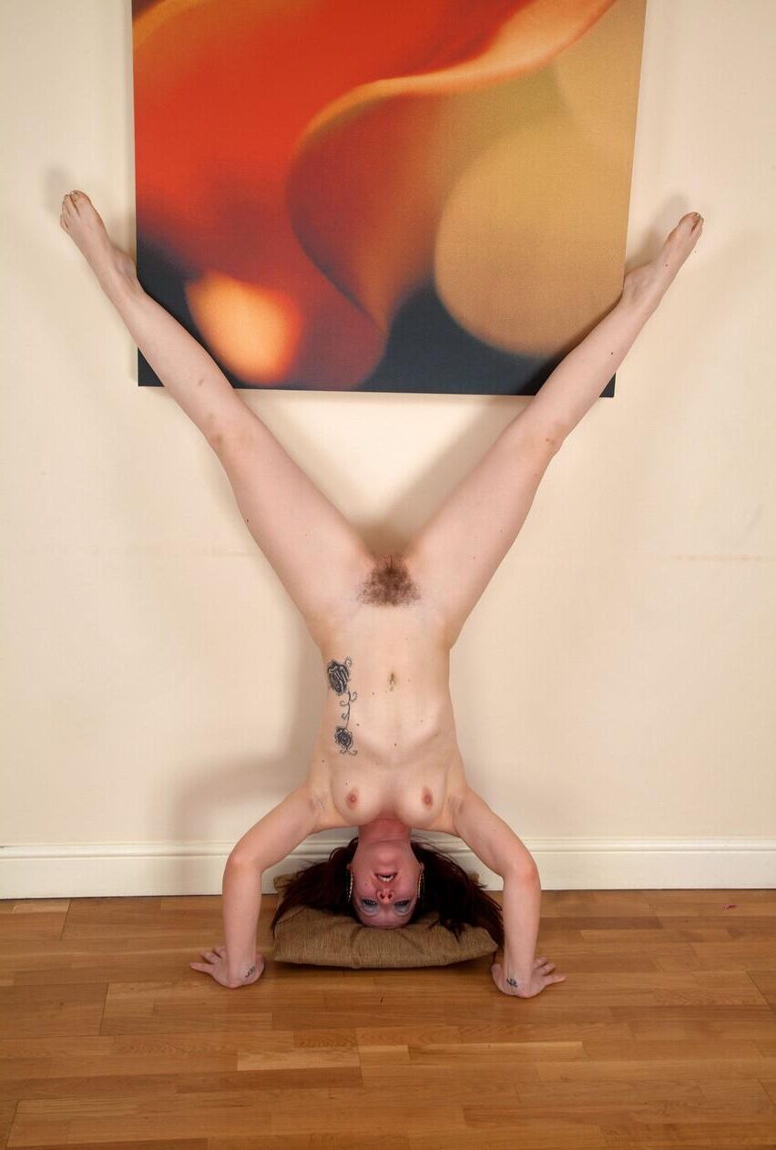 Slender pale skinned redhead with a hairy bush bonita